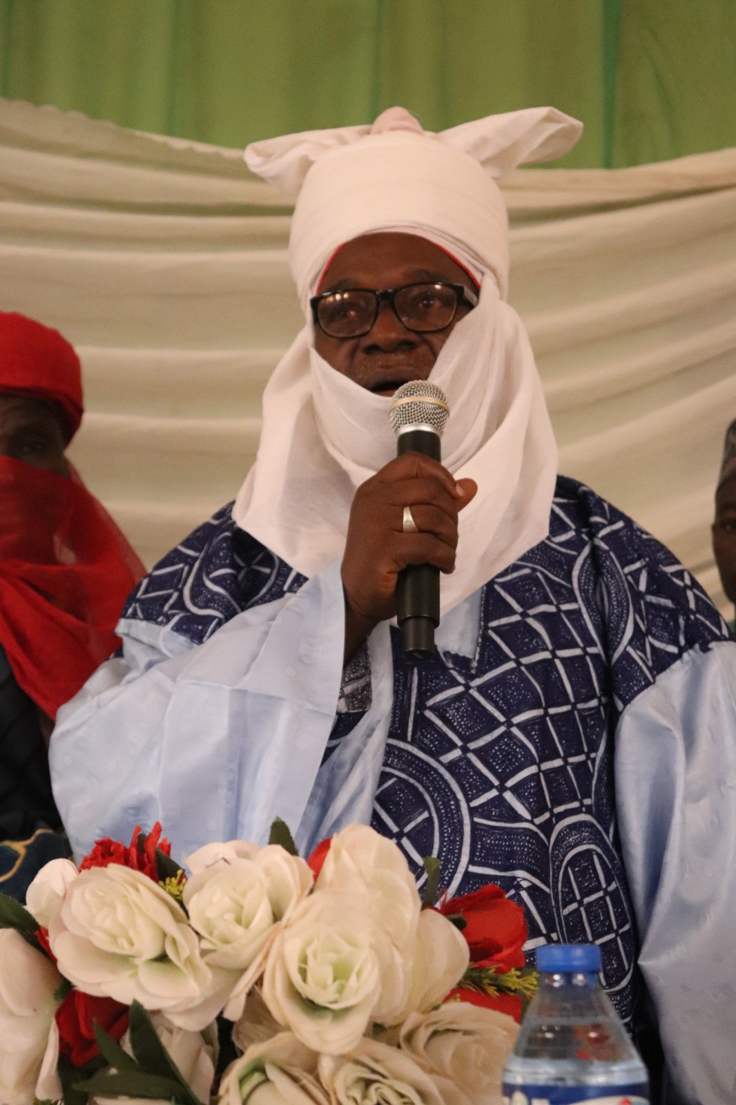 Alhaji Tanko Bazanfare. Senior District Head of Gindiri. Giving a goodwill message